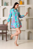Turquoise Ikat Print Shirt Dress - Side view smiling